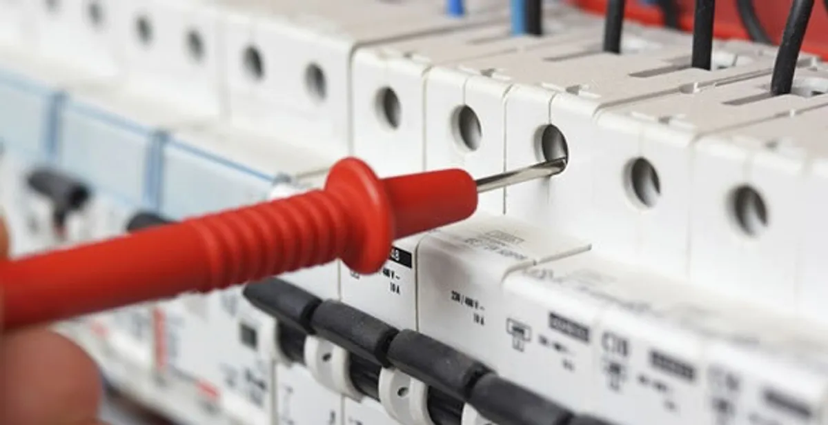 Electrical contractor testing circuit breakers during electrical repair in La Canada Flintridge, CA