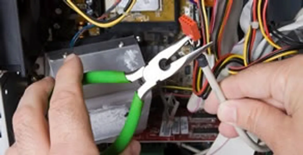 Licensed electrical contractor performing electrical repair with tools in San Marino, CA