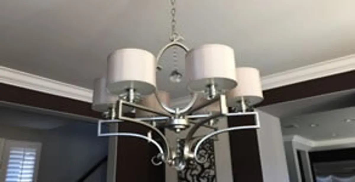 Modern chandelier installation with multiple light fixtures in Pasadena, CA